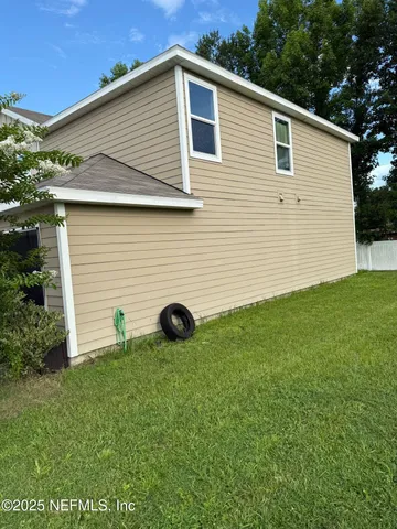 a view of a backyard with a garden