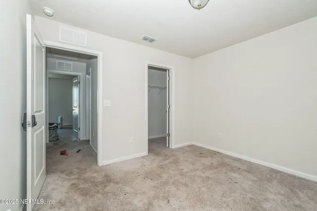 an empty room with closet