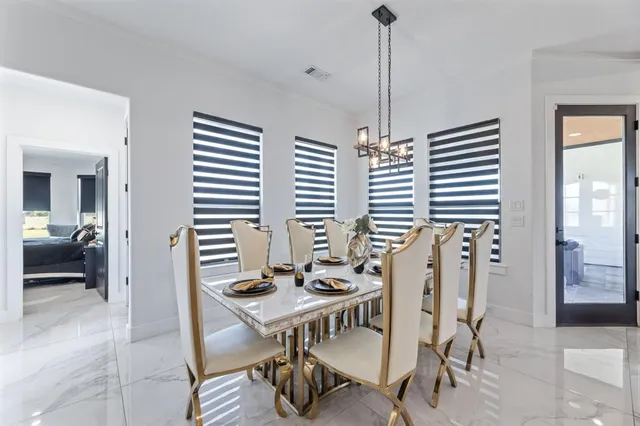 a view of a livingroom with furniture and window