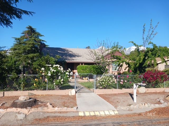 103 North Clay Street Independence, CA 93526 - Photo 3 of 25 a view of a garden