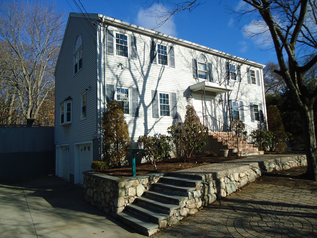 43 Parkland Road Needham, MA 02494 - Photo 1 of 30 a front view of a house