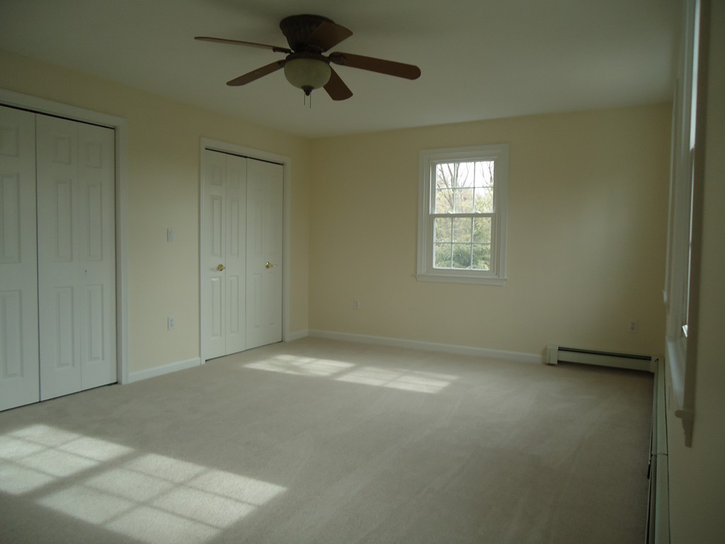 43 Parkland Road Needham, MA 02494 - Photo 25 of 30 a view of an empty room and a window
