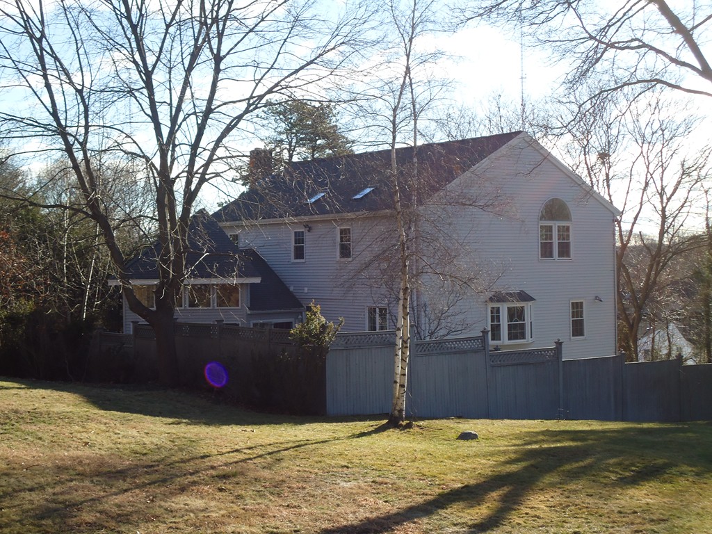 43 Parkland Road Needham, MA 02494 - Photo 3 of 30 a view of swimming pool next to a building