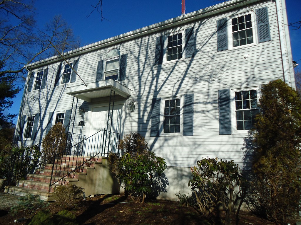 43 Parkland Road Needham, MA 02494 - Photo 4 of 30 front view of a house with a street