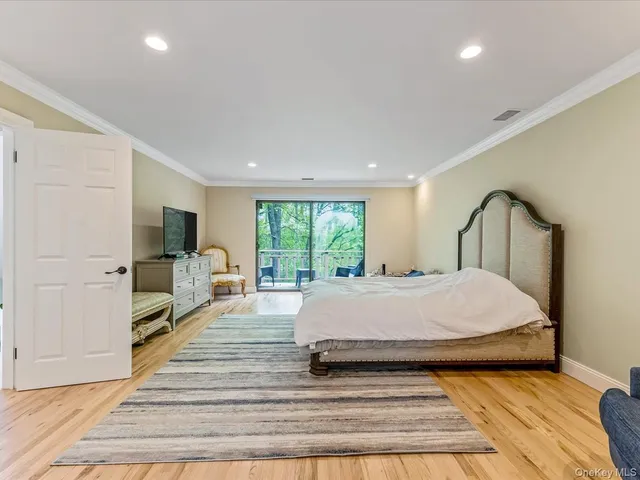 a view of a two chairs and table in the balcony