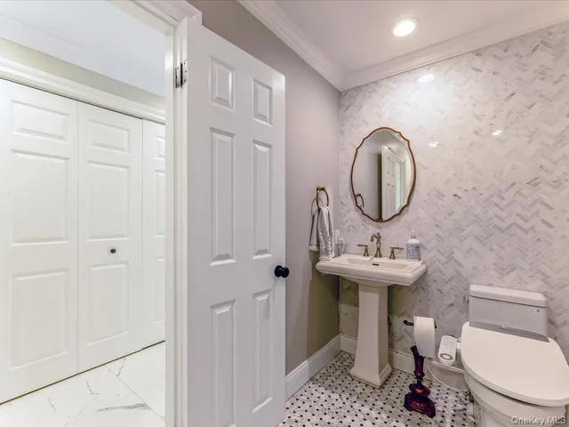 a view of a kitchen with stove and cabinets
