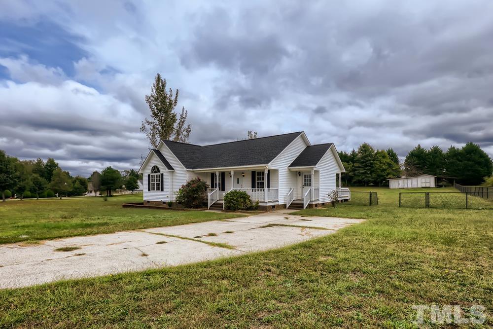 386 Rosa Circle Willow Spring, NC 27592 - Photo 2 of 27 a front view of house with yard and green space