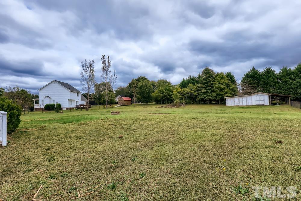 386 Rosa Circle Willow Spring, NC 27592 - Photo 24 of 27 a view of a garden