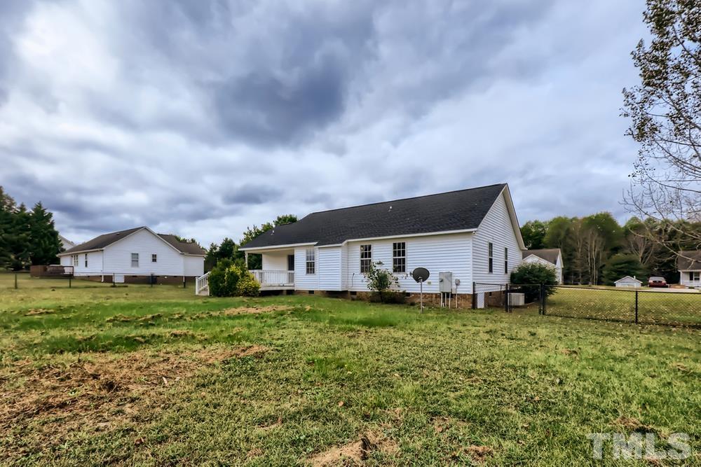 386 Rosa Circle Willow Spring, NC 27592 - Photo 27 of 27 front view of a house with a yard