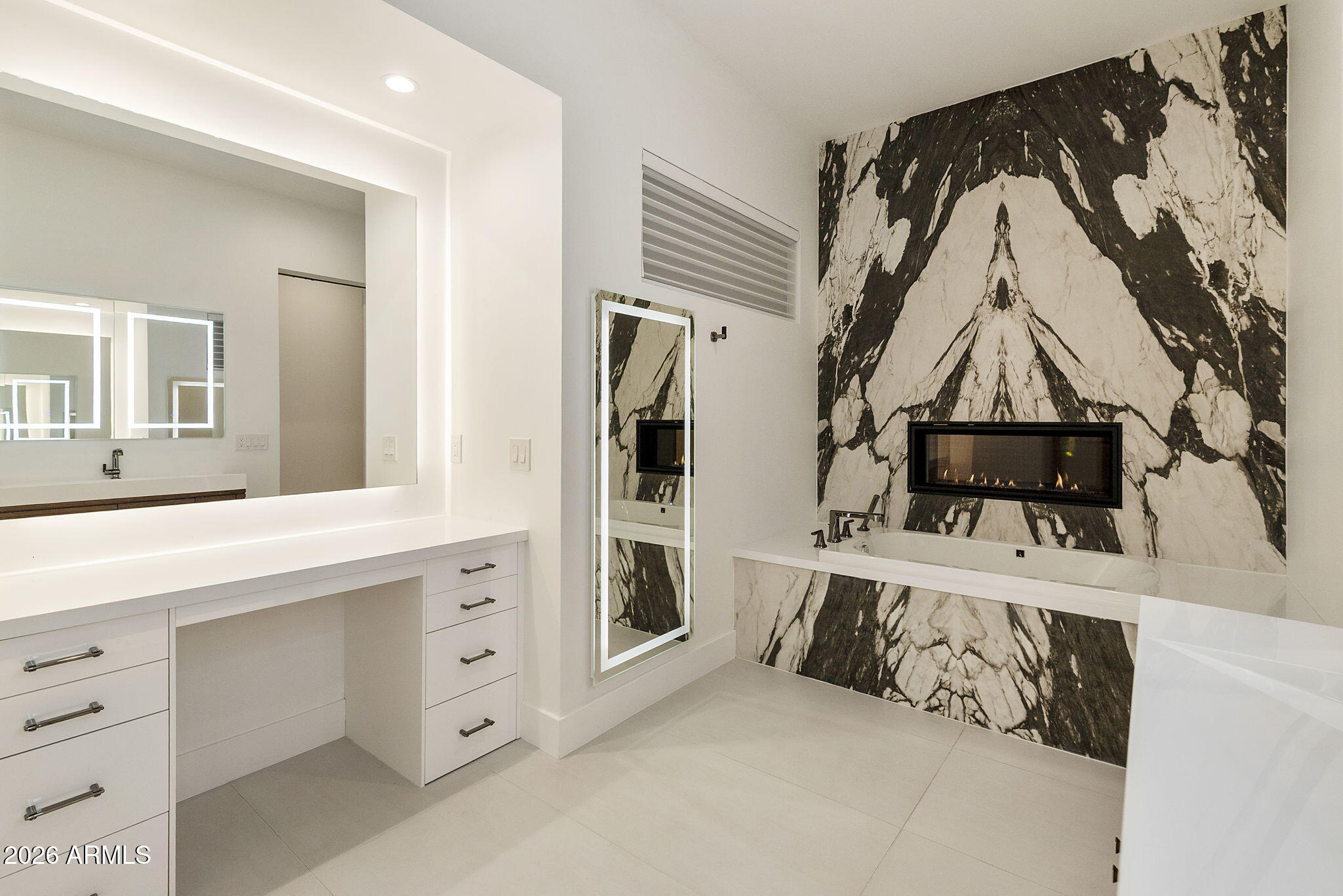 3035 East Coolidge Street Phoenix, AZ 85016 - Photo 13 of 40 a view of a bedroom with furniture and flat screen tv