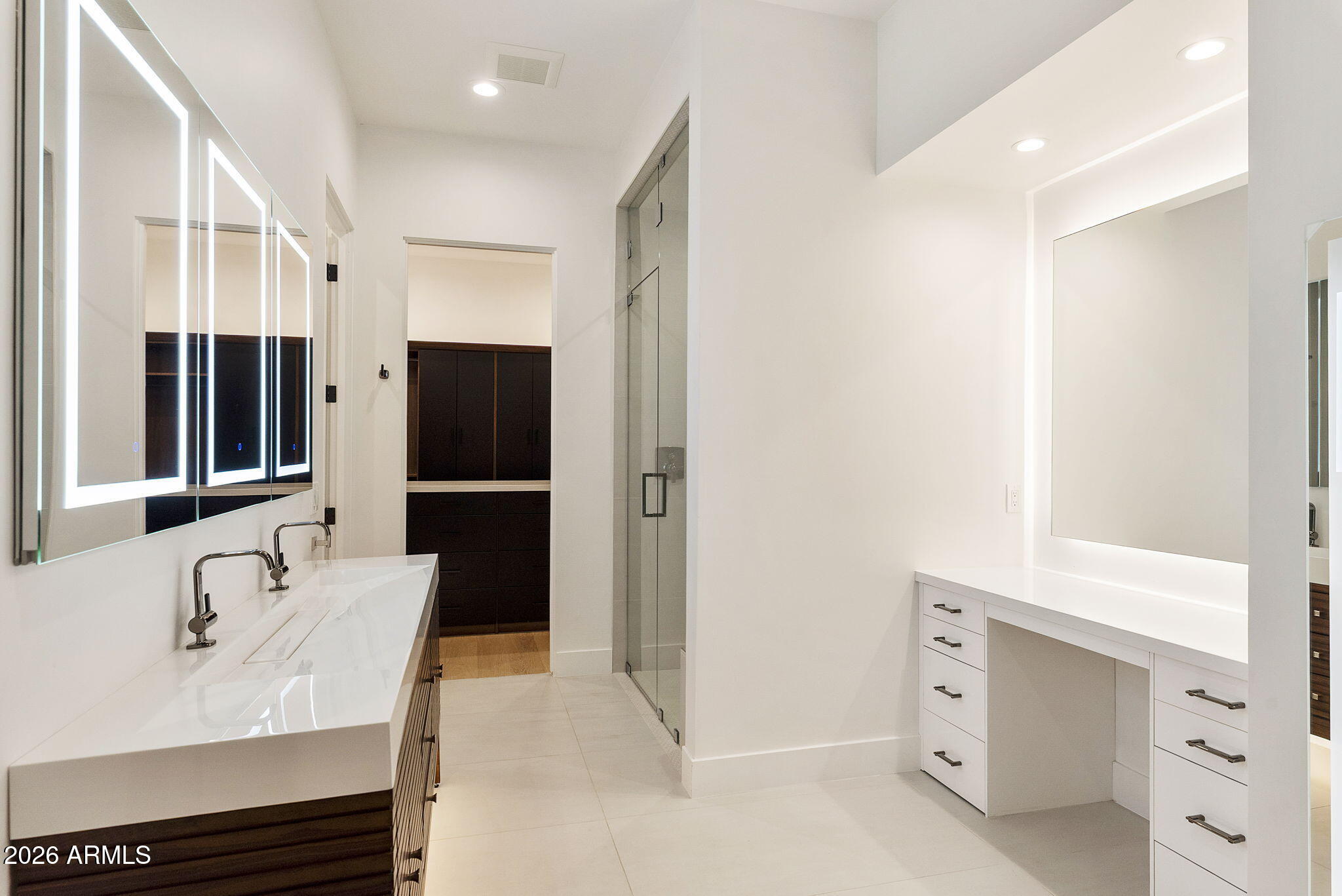 3035 East Coolidge Street Phoenix, AZ 85016 - Photo 15 of 40 a bathroom with a sink and a mirror