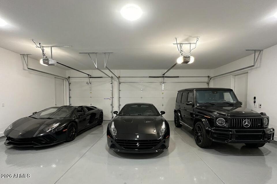 3035 East Coolidge Street Phoenix, AZ 85016 - Photo 28 of 40 a car that is parked in a garage