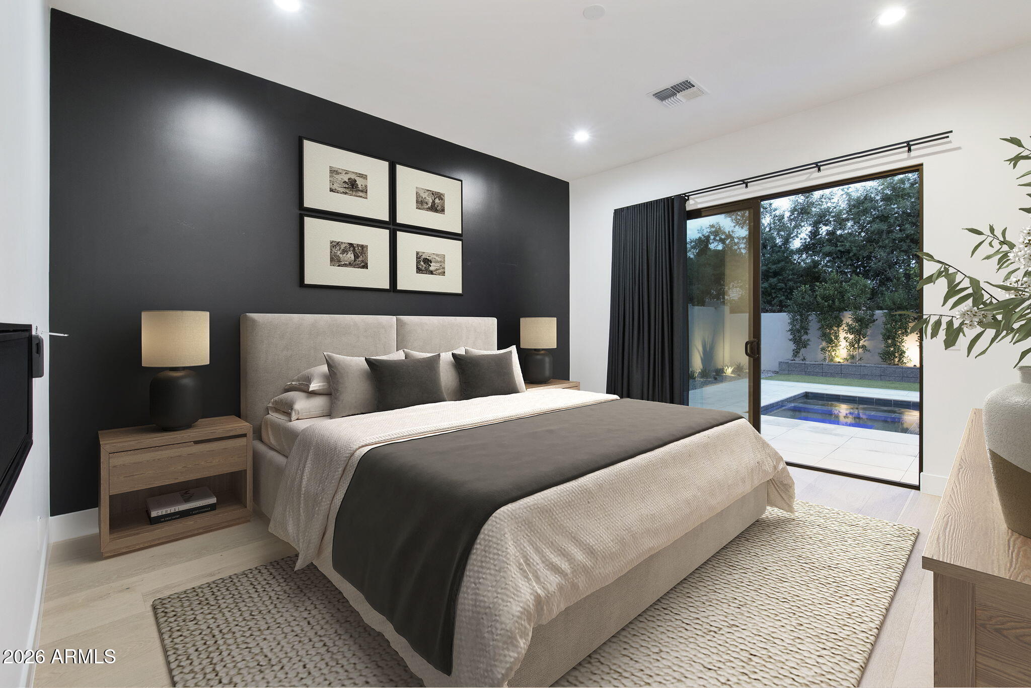 3035 East Coolidge Street Phoenix, AZ 85016 - Photo 3 of 40 a bedroom with a large bed and a large window