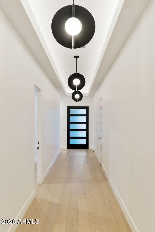 3035 East Coolidge Street Phoenix, AZ 85016 - Photo 6 of 40 a view of a chandelier fan and wooden floor