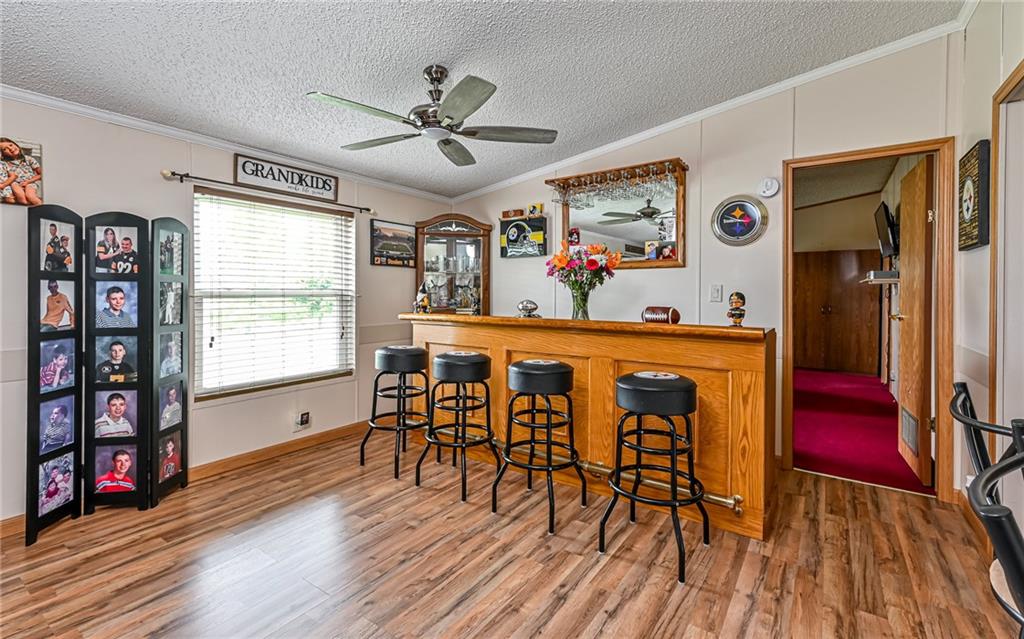 307 Hungarian Road Slippery Rock, PA 16057 - Photo 6 of 34 a dining room with furniture window and wooden floor