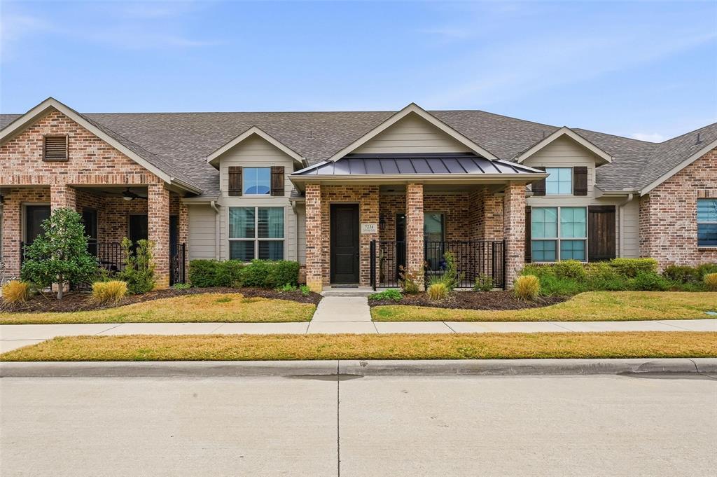 7236 Calistoga Lane Grand Prairie, TX 75054 - Photo 1 of 40 front view of a house with a yard
