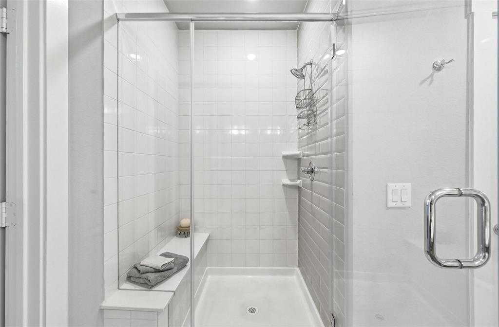 7236 Calistoga Lane Grand Prairie, TX 75054 - Photo 31 of 40 a bathroom with a shower and a sink