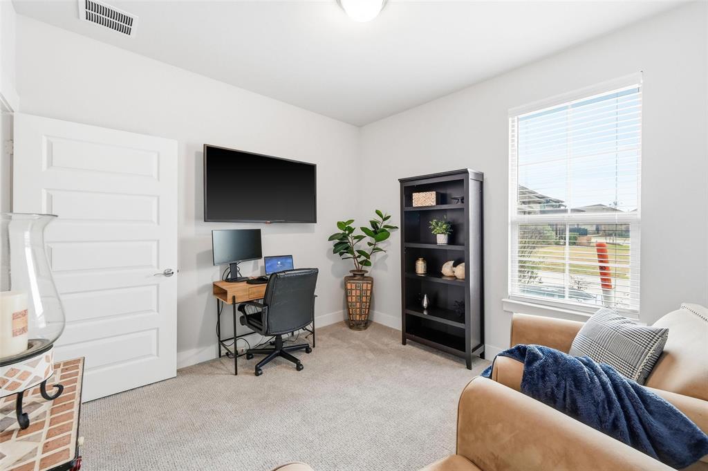 7236 Calistoga Lane Grand Prairie, TX 75054 - Photo 33 of 40 a view of a livingroom with workspace and a window