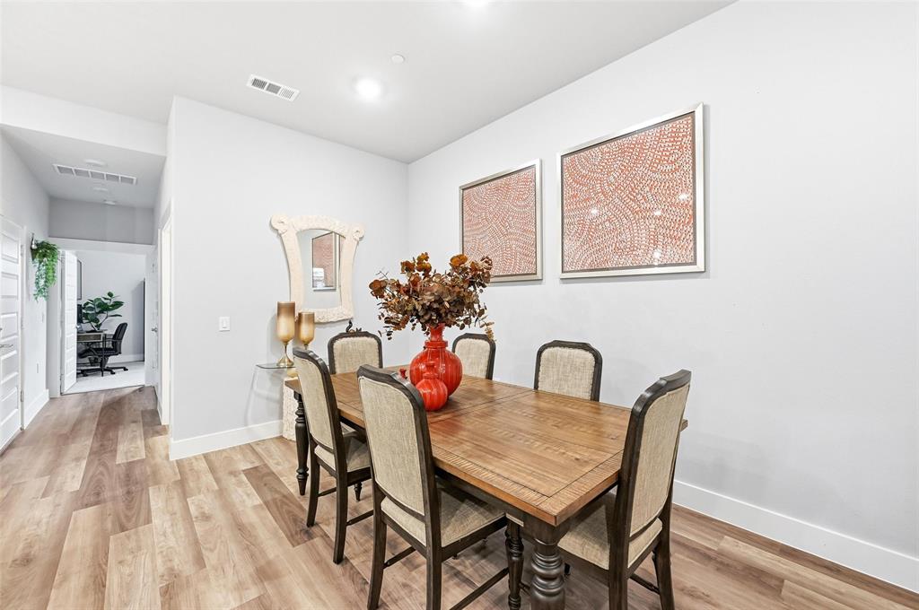 7236 Calistoga Lane Grand Prairie, TX 75054 - Photo 10 of 40 a dining room with furniture and wooden floor