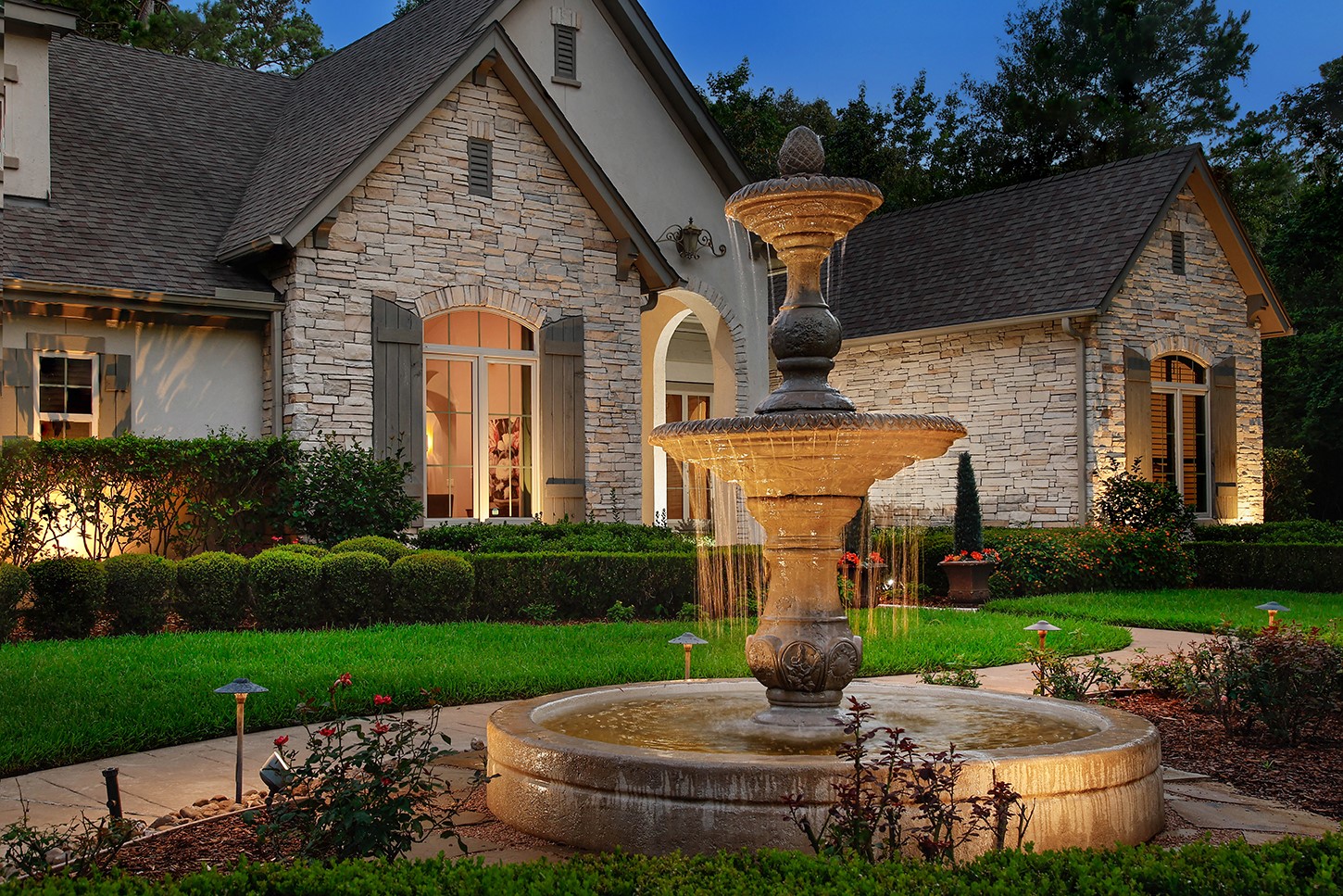 119 Angel Leaf Road The Woodlands, TX 77380 - Photo 5 of 50 a front view of a house with garden