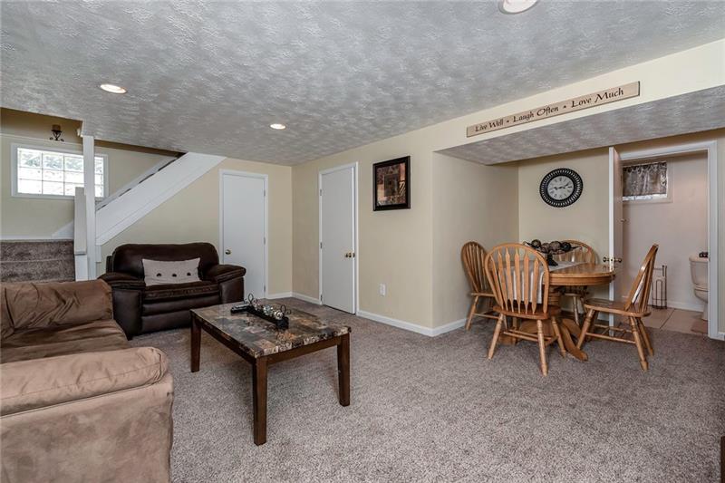 5365 Meadowcrest Road Pittsburgh, PA 15236 - Photo 21 of 25 The finished game room features an updated half bathroom.