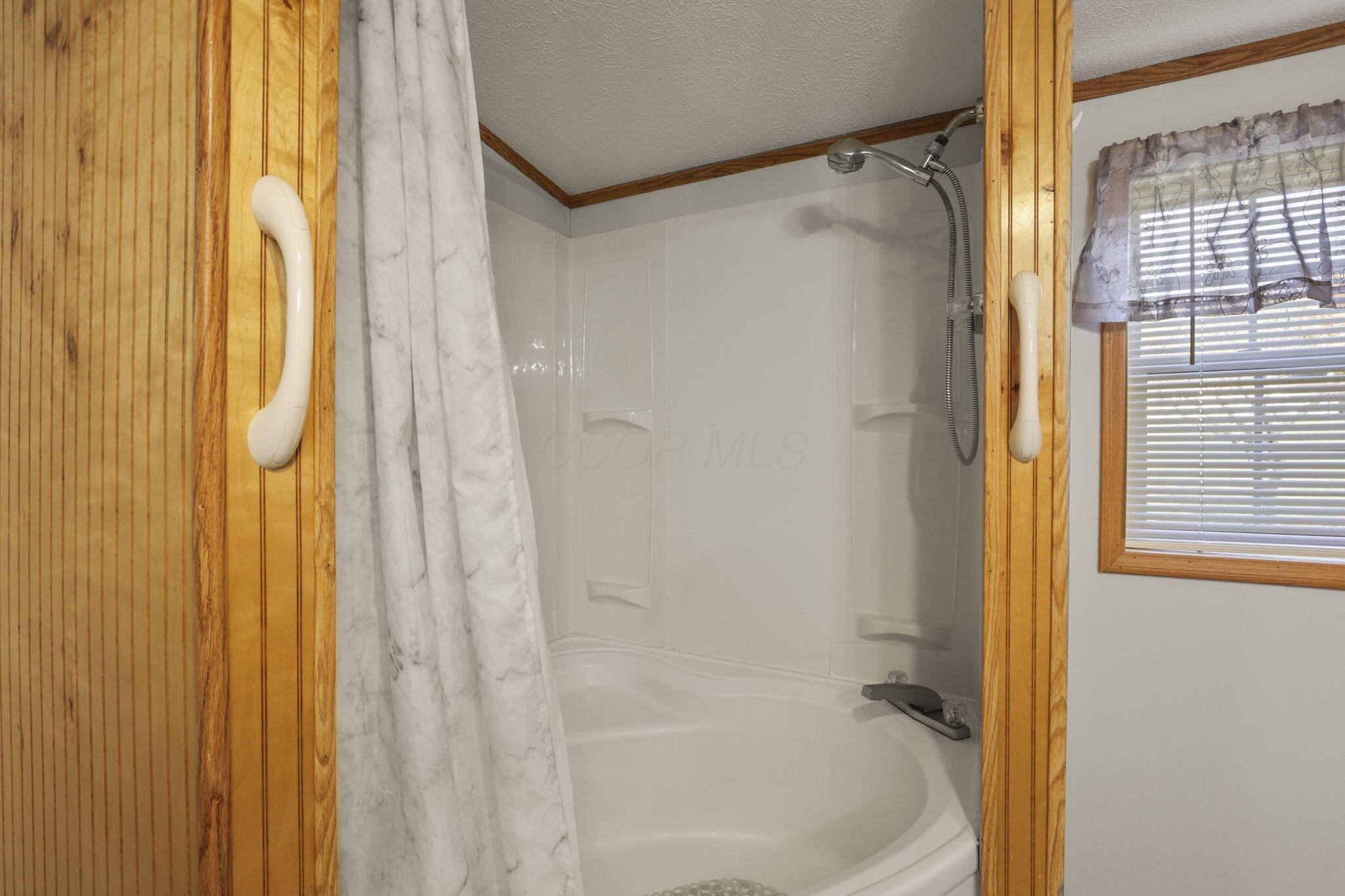2782 James Road Granville, OH 43023 - Photo 33 of 42 Primary bath tub & shower