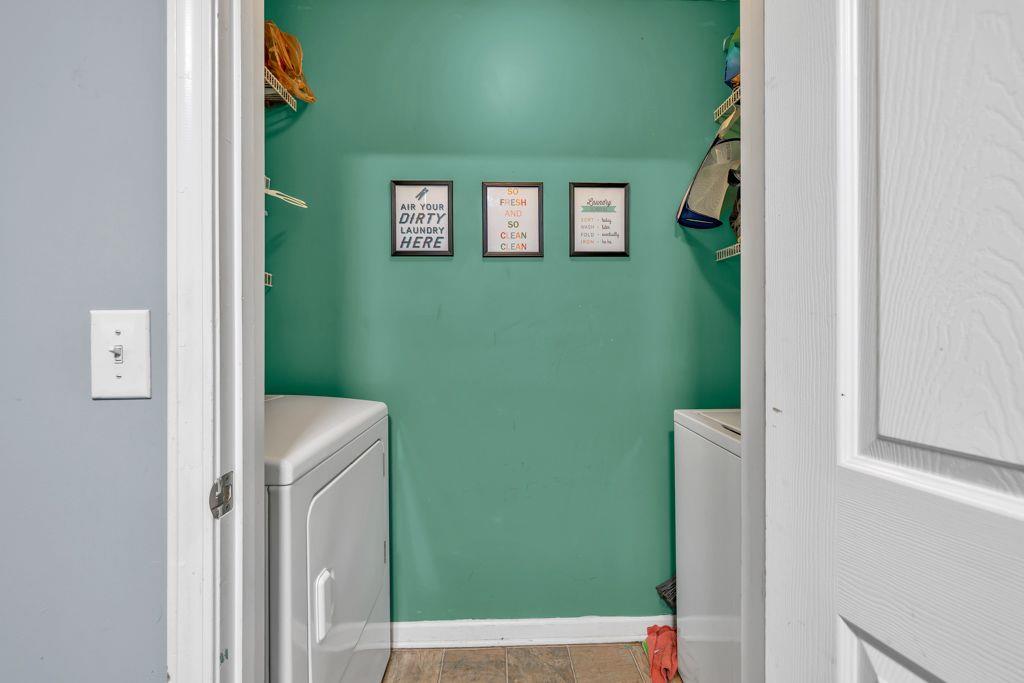 233 Tara Commons Walk Loganville, GA 30052 - Photo 29 of 52 a view of a room that has window in it