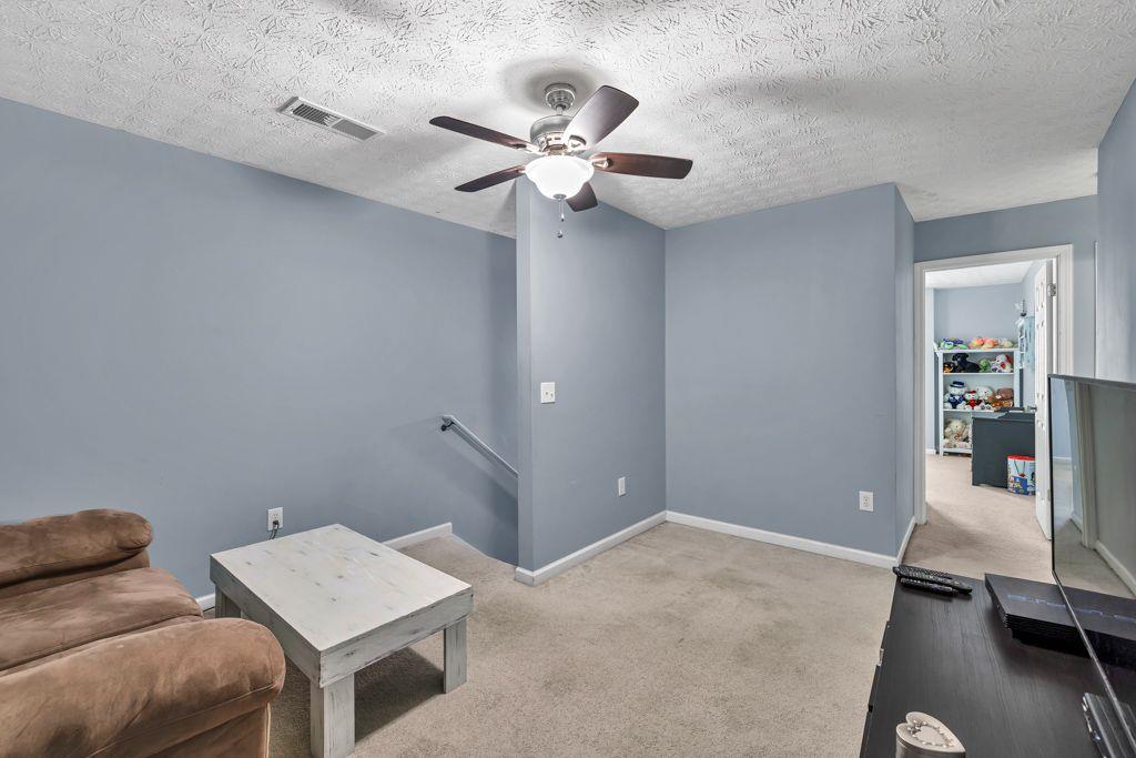 233 Tara Commons Walk Loganville, GA 30052 - Photo 32 of 52 a workspace with furniture and window