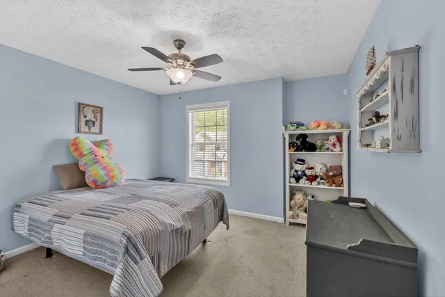 wooden floor in a bedroom and a dresser
