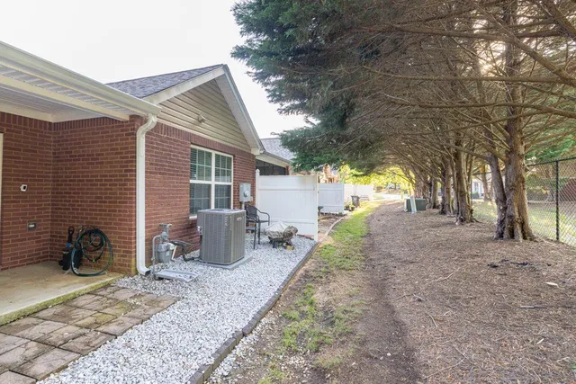 a view of outdoor space with signage and flags