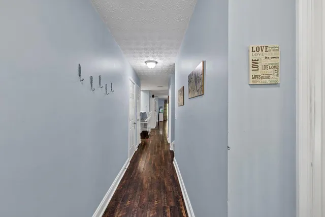 a view of workspace with wooden floor