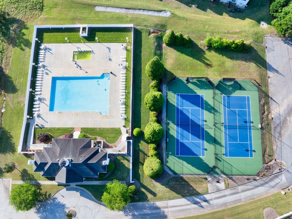 233 Tara Commons Walk Loganville, GA 30052 - Photo 51 of 52 an aerial view of a house with a yard and potted plants