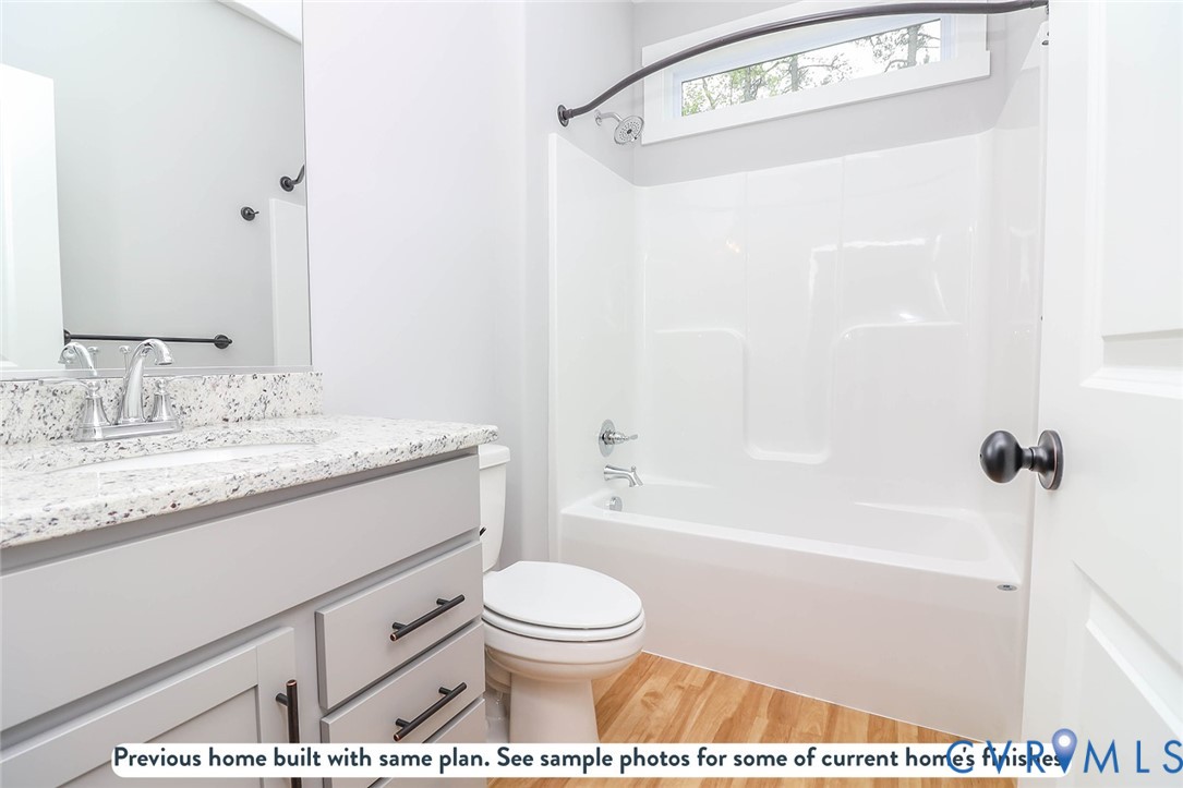 Tbd Lewiston Plank Road Burkeville, VA 23922 - Photo 10 of 18 a bathroom with a granite countertop sink toilet a shower and a mirror