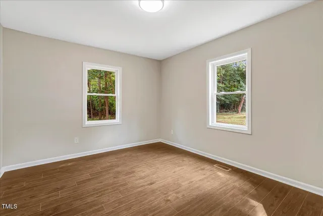 an empty room with a window