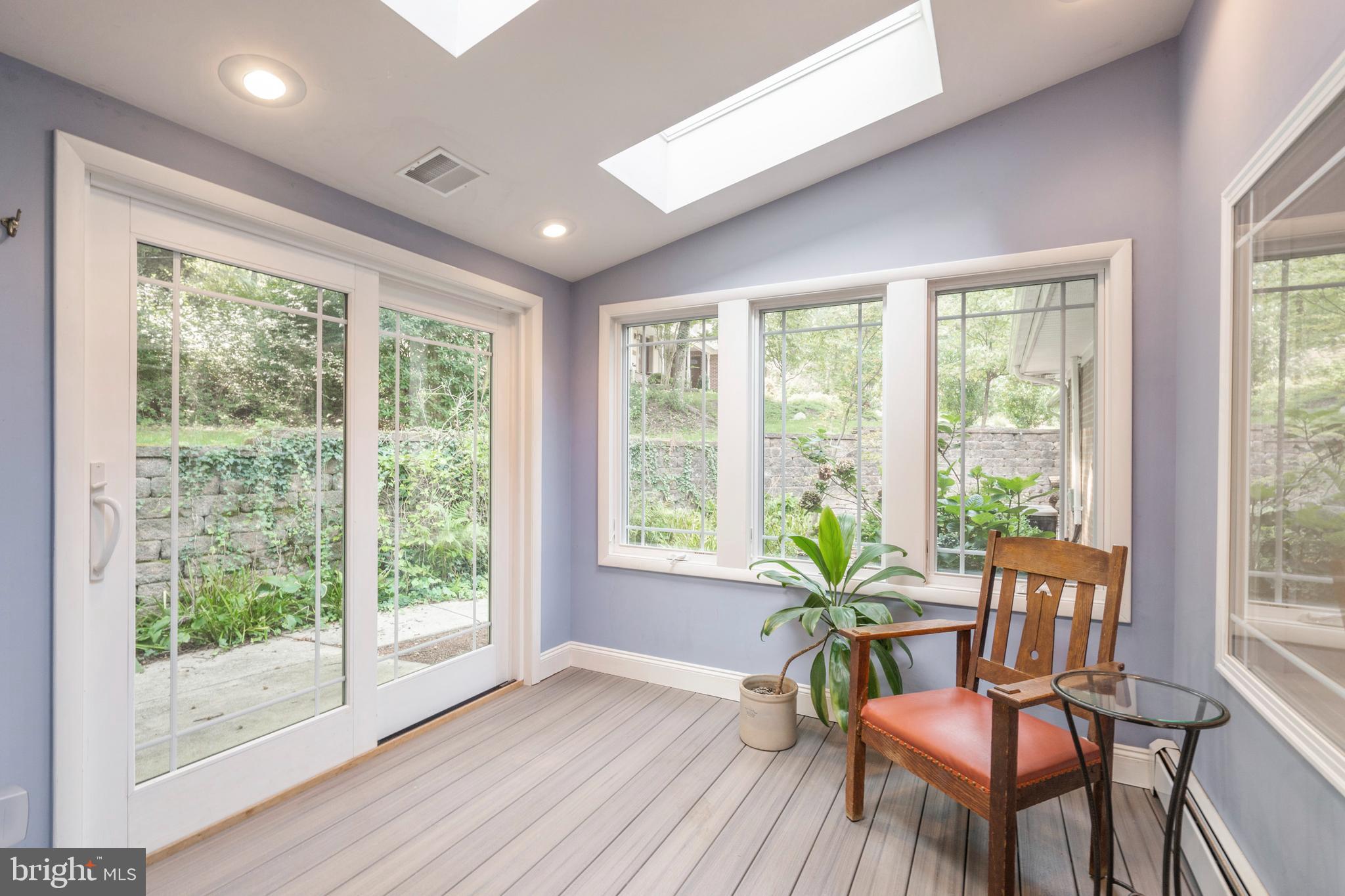 489 Woodhill Road Wayne, PA 19087 - Photo 19 of 48 Sunroom with skylights and sliders to backyard