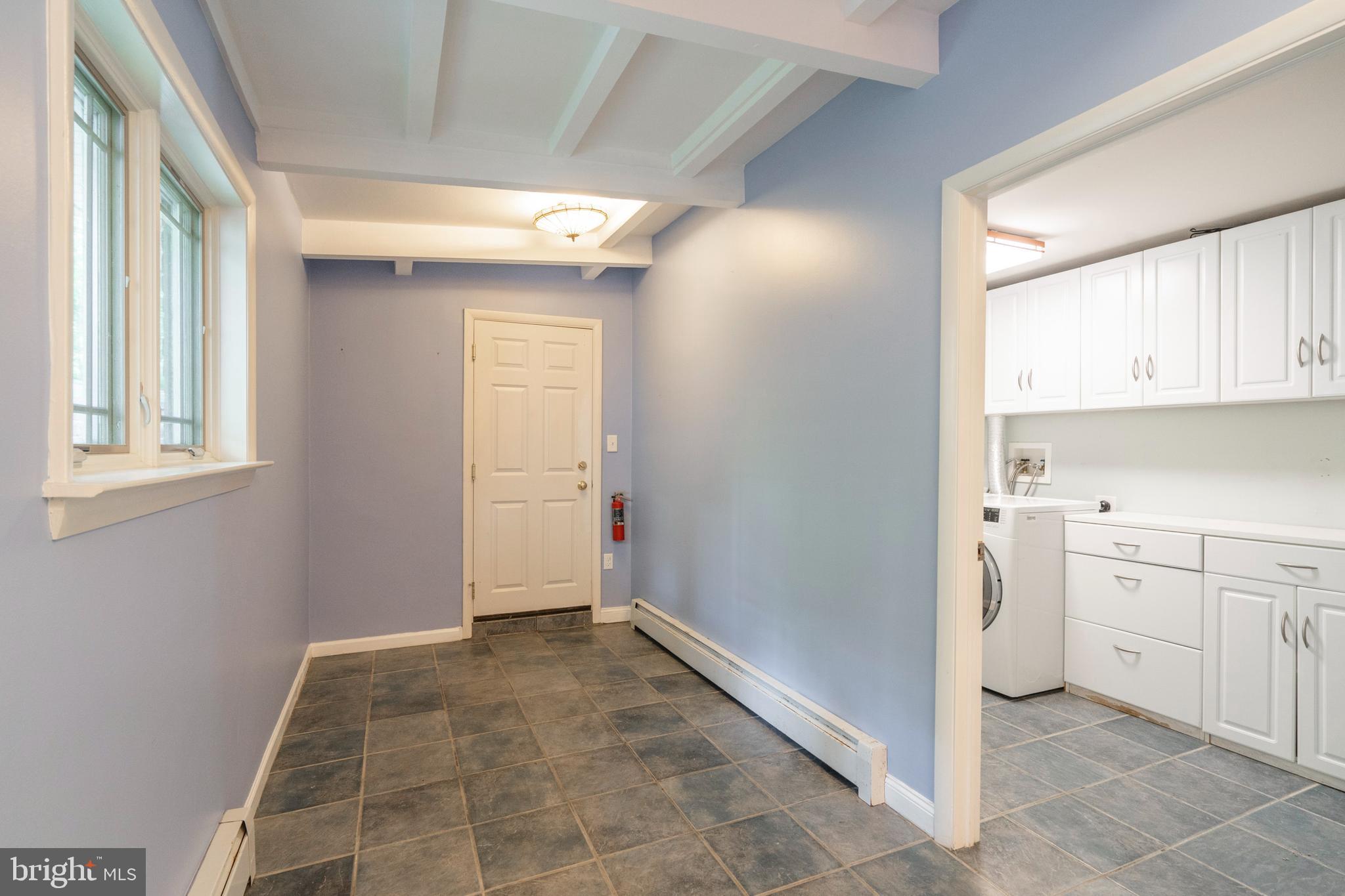 489 Woodhill Road Wayne, PA 19087 - Photo 35 of 48 Doors to 2 car Garage and Laundry Room
