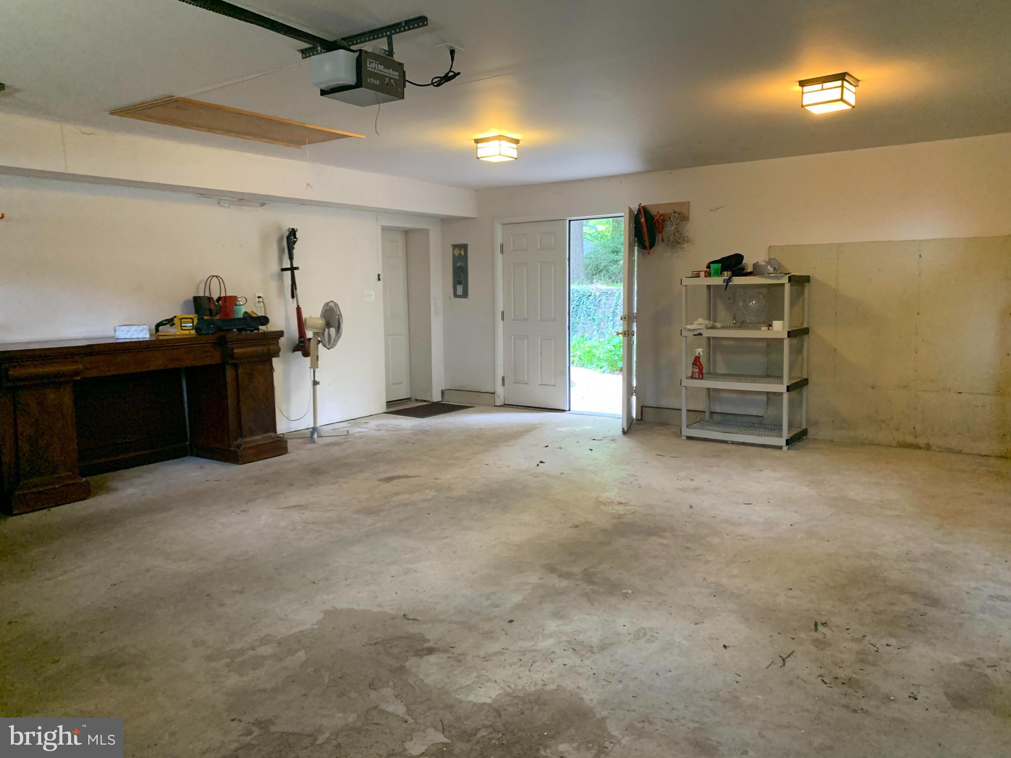 489 Woodhill Road Wayne, PA 19087 - Photo 38 of 48 Garage w inside access & double doors to backyard