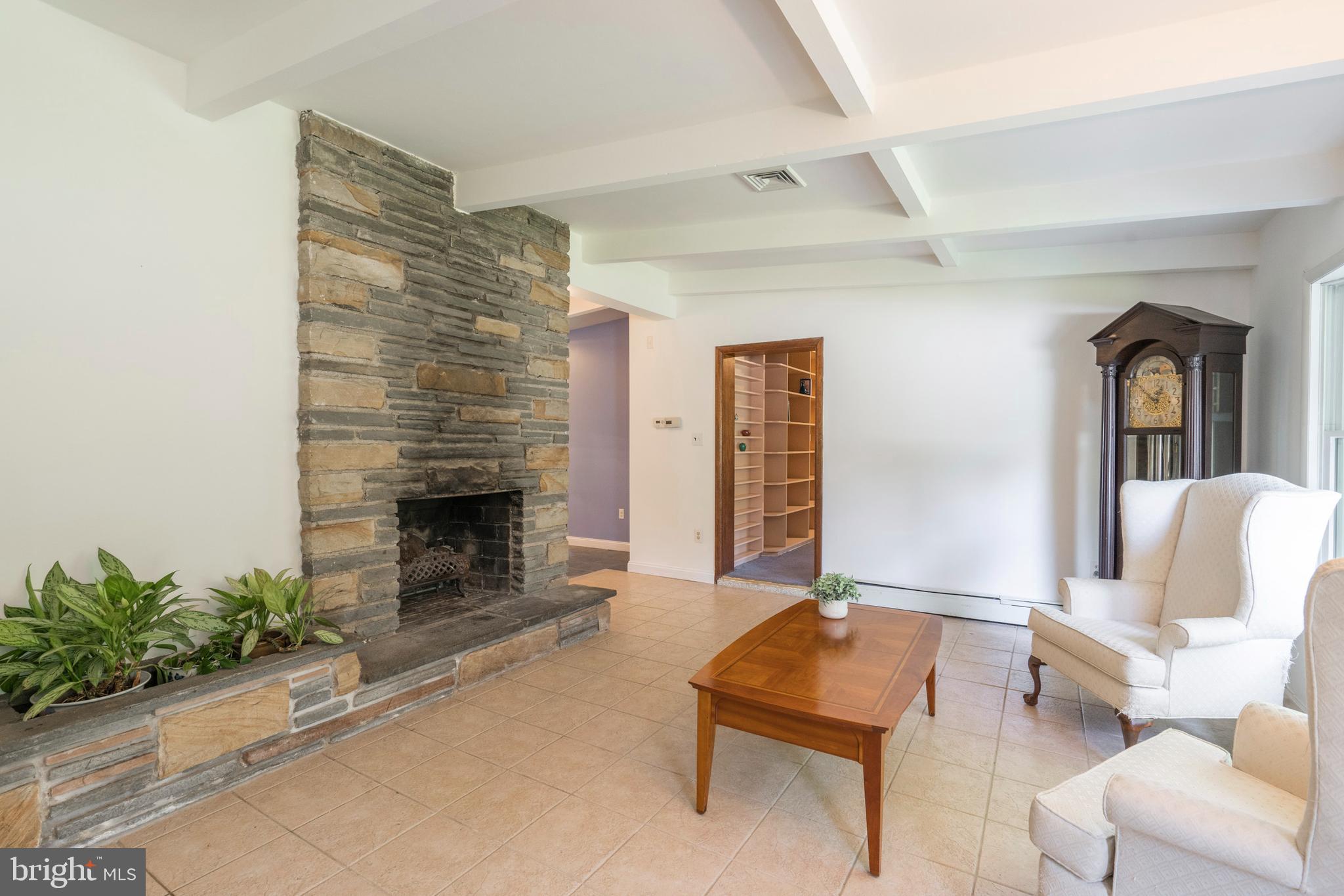 489 Woodhill Road Wayne, PA 19087 - Photo 6 of 48 Living Room w wood burning fireplace