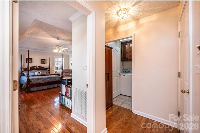 a view of a living room and a wooden floor