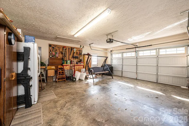 a view of a garage with chairs