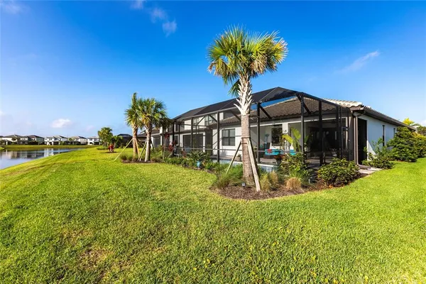 a view of a lake with a garden