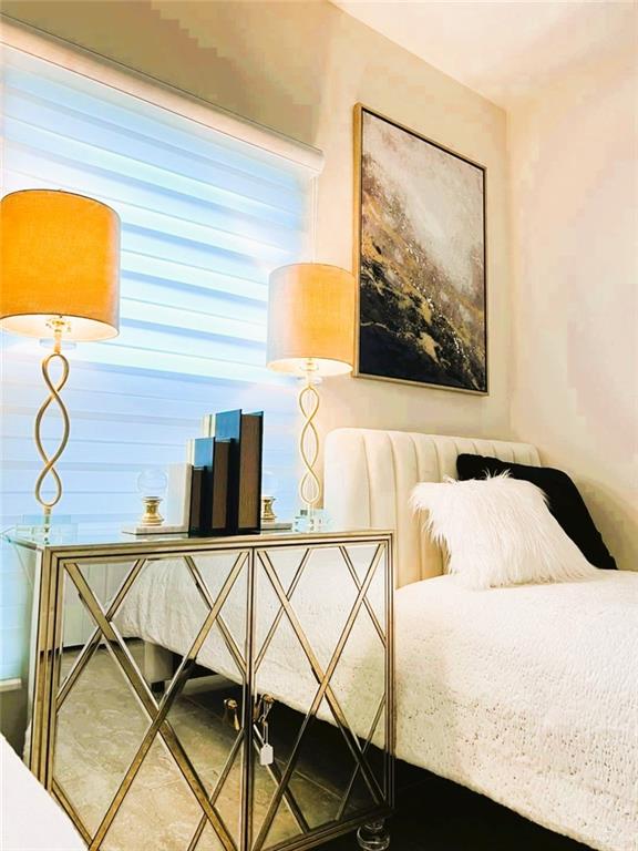 5302 Vision Street Rio Grande City, TX 78582 - Photo 11 of 19 a bedroom with a bed and wall painting