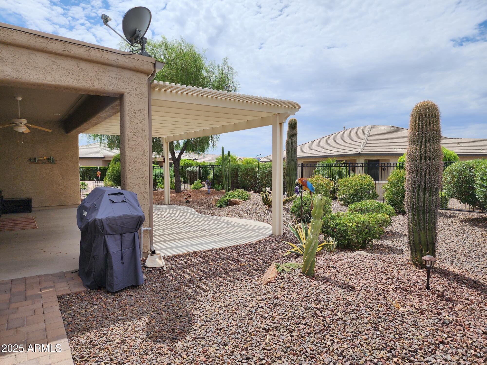20002 North 269th Drive Buckeye, AZ 85396 - Photo 19 of 29 a view of a patio with a table and chairs