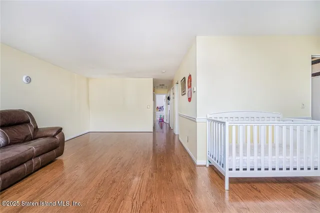 a view of a livingroom with wooden floor