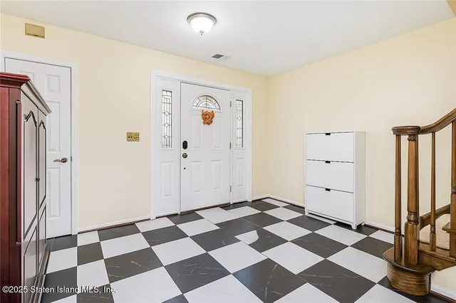 a view of a black and white checkered floor with a black white checkered floor