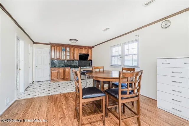 a view of a dining room with furniture