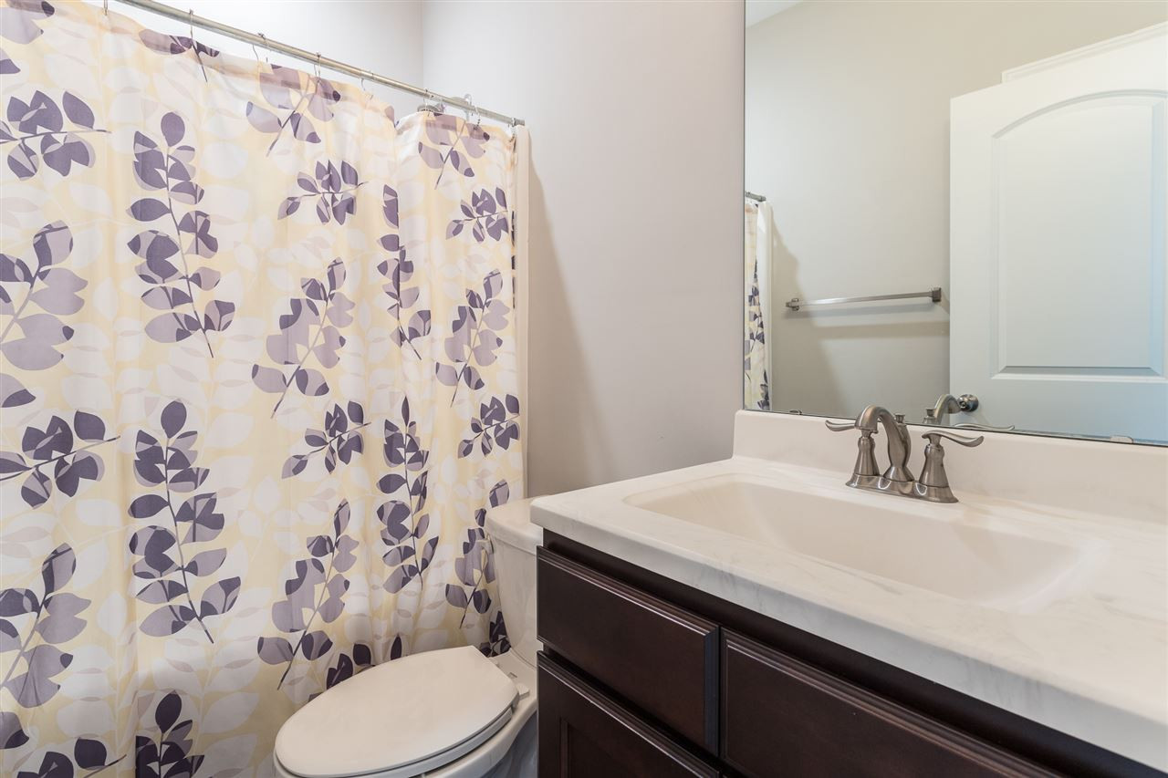 3318 High Gate Road Raleigh, NC 27603 - Photo 12 of 16 Second bathroom between both bedrooms for convenience! Bathroom