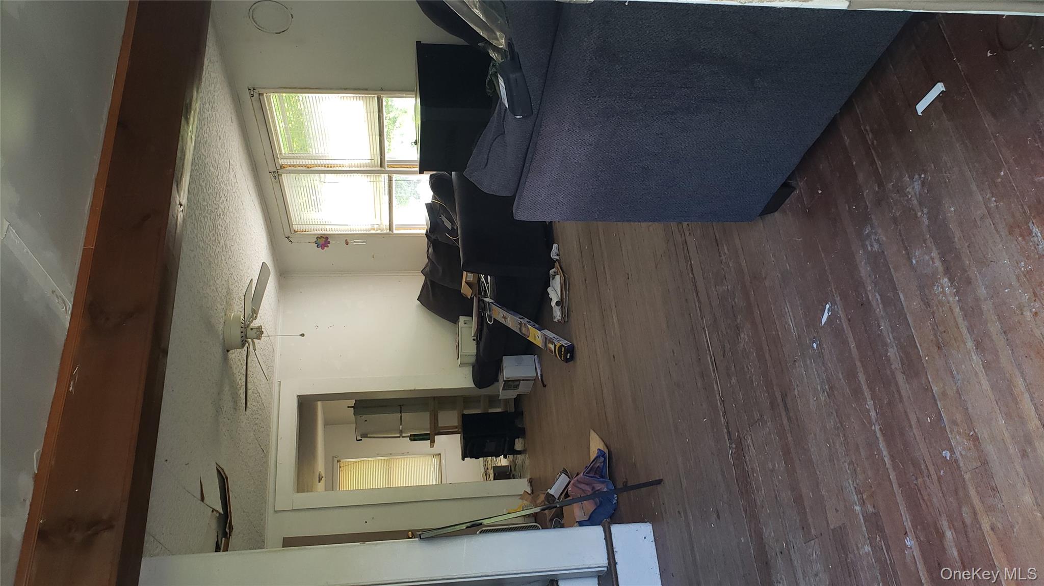 14 Southeast Mountain Road Wingdale, NY 12594 - Photo 2 of 10 a living room with furniture and a window