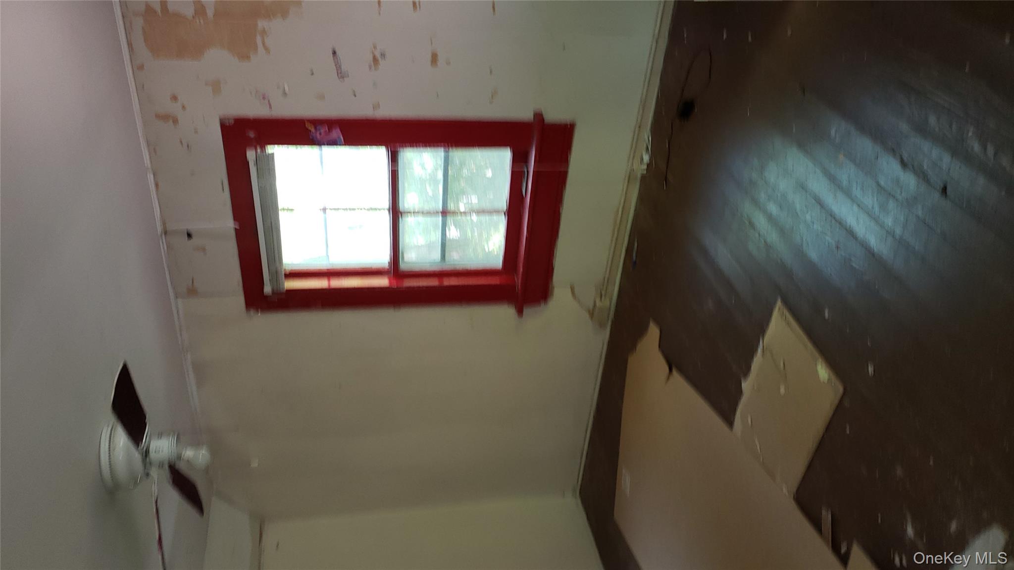 14 Southeast Mountain Road Wingdale, NY 12594 - Photo 9 of 10 an empty room with wooden floor and windows