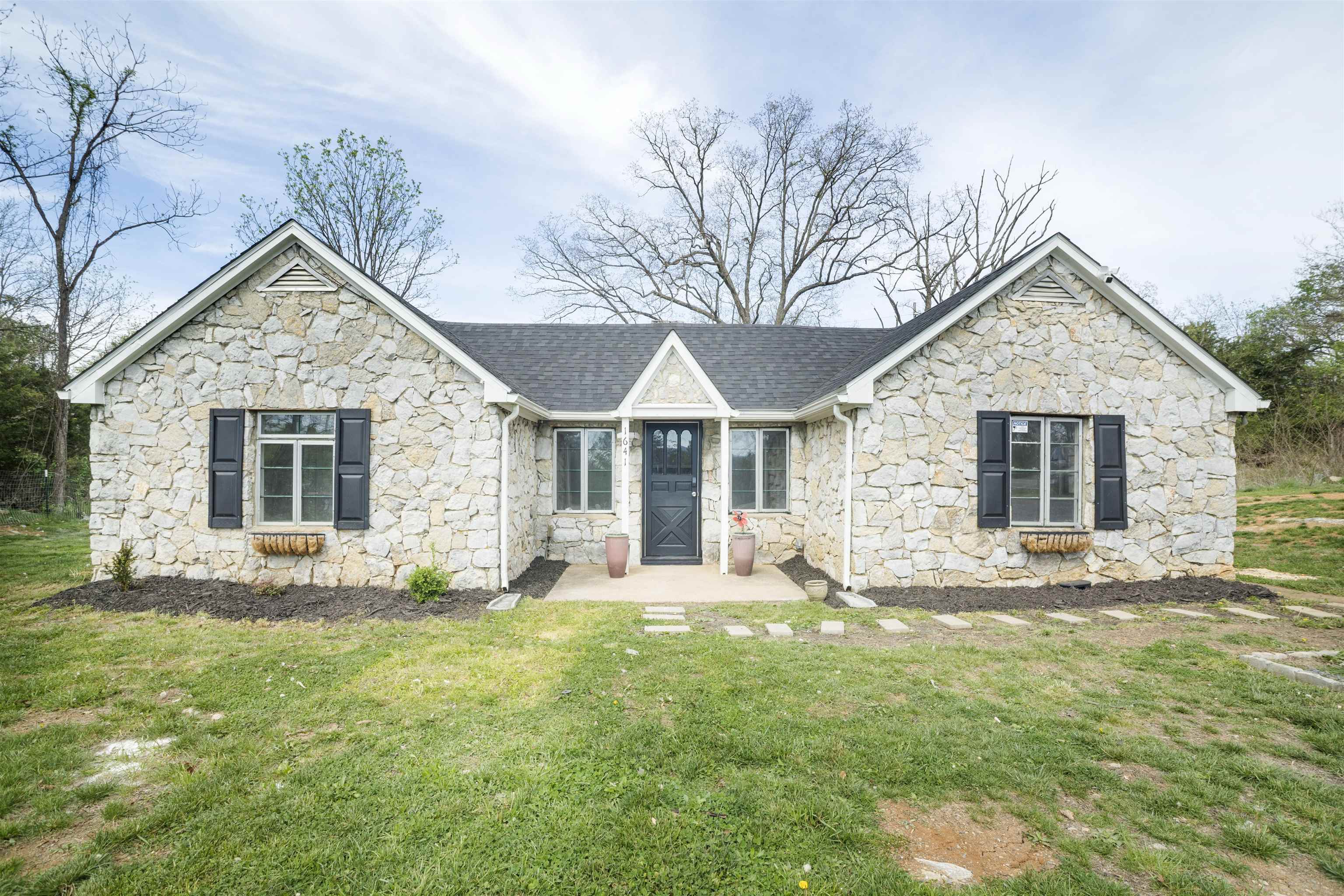 1641 Smithland Road Harrisonburg, VA 22802 - Photo 29 of 44 a front view of a house with a yard